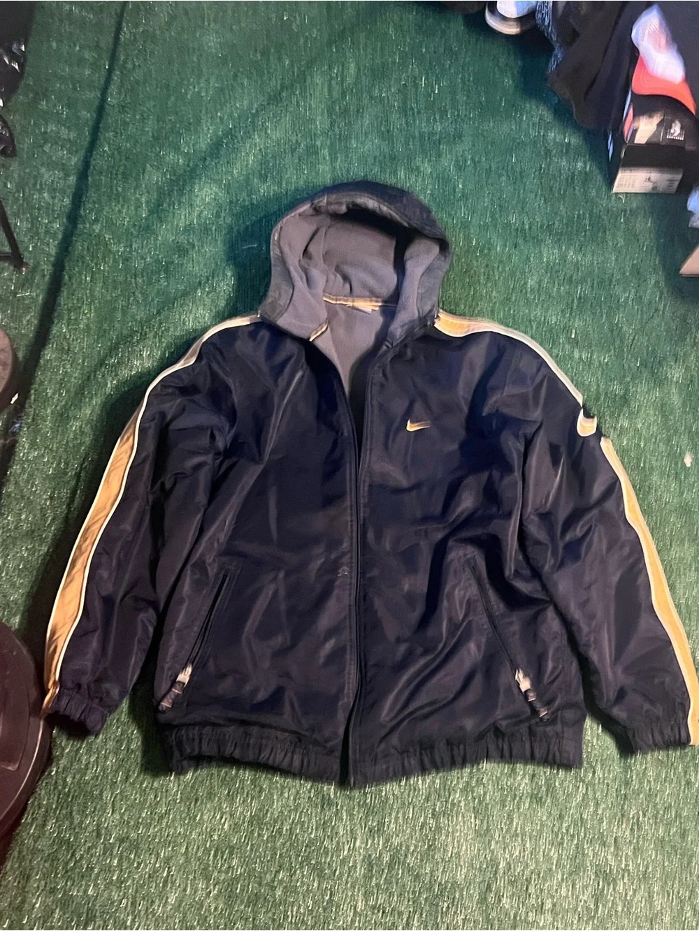 Nike Men’s Navy Windbreaker Jacket with Gold Stripe Accents